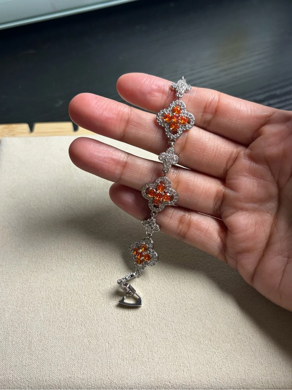Silver Floral Bracelet with Orange Crystal Accents